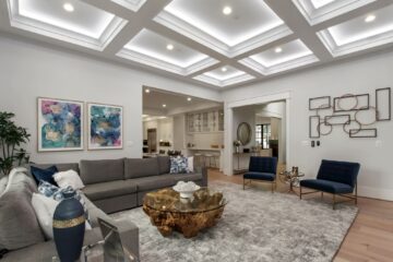 Luxury living area interior in a custom modern home, opposite view.