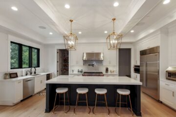 The countertop bar in the kitchen of a custom modern home.