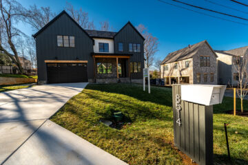 A front view of a large modern home at 8514 Meadowlark.