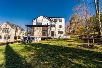 A back view of a large modern home.