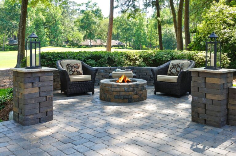 beautiful outdoor firepit with two comfortable arm chairs