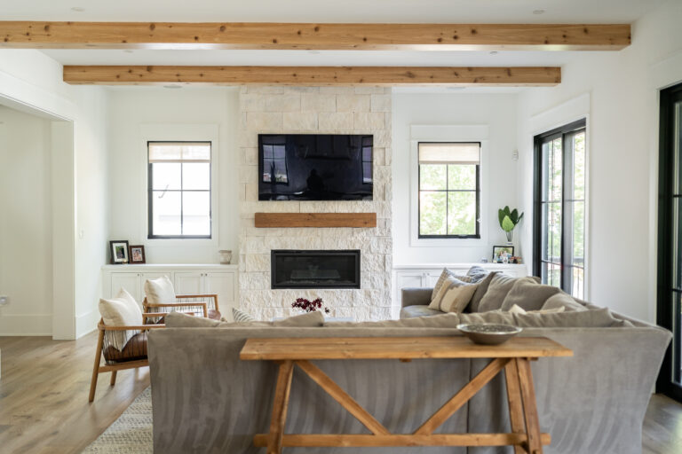 rosedale living room fireplace beamed ceilings